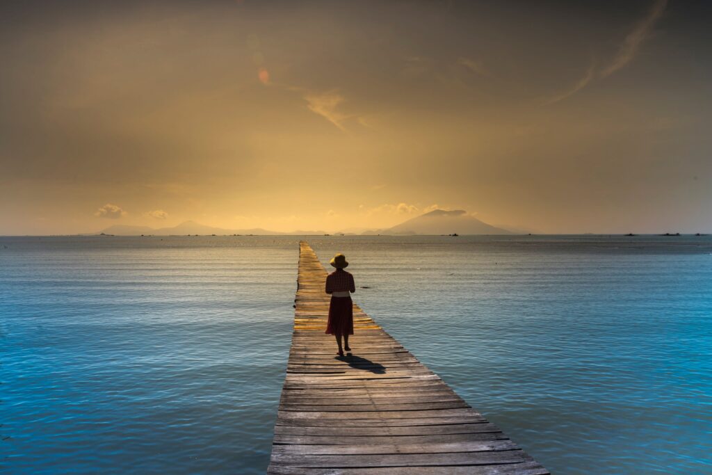 woman looking out over the ocean for something better in life